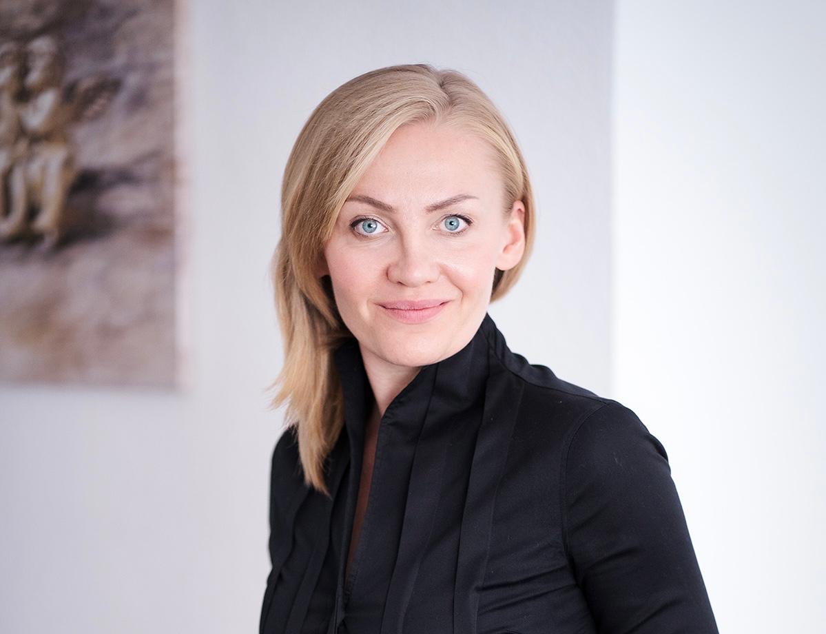 Elena - Immobilienexpertin